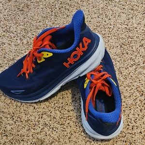 Hoka  Blue Sneakers with Red and Yellow Accents